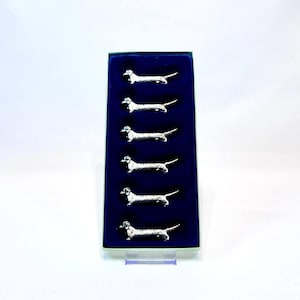 Reposacuchillos vintage de perro salchicha
