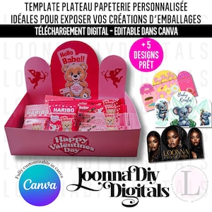 Peut inclure: Une boîte d'exposition rose sur le thème de la Saint-Valentin, avec un ours en peluche et un motif de cœur. La boîte contient des bonbons et des chocolats roses. L'image comprend également d'autres motifs et le texte "Happy Valentines Day".