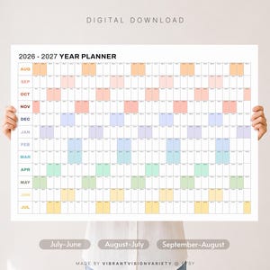 May include: A 2026-2027 year planner wall calendar featuring a grid layout with months from August to July labelled on the left. The design includes alternating pastel coloured blocks for days across a white background with the text DIGITAL DOWNLOAD.