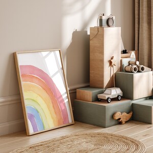 Pink-themed rainbow nursery decor for girls room