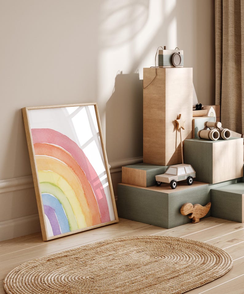 Pink-themed rainbow nursery decor for girls room