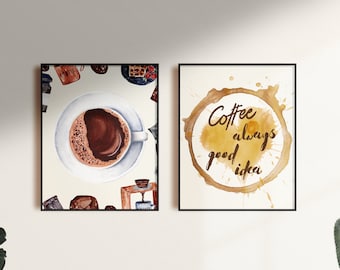 Op de afbeelding: Twee ingelijste aquarelprints met een koffiemotief. De eerste print toont een kopje koffie met een schoteltje en koffiebonen, chocolade en een koffiemolen. De tweede print toont een koffievlek met de tekst "Coffee always a good idea".