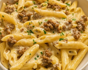 Receta de pasta penne cremosa con mantequilla de ajo: carne molida y queso (Descargar PDF)