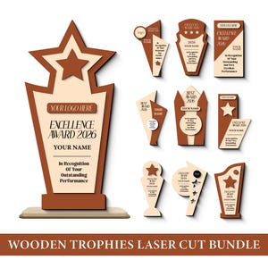 Puede incluir: Colección de trofeos de madera cortados con láser en varias formas y tamaños. Los trofeos presentan una combinación de colores marrón y beige, con diseños de estrellas y escudos. El texto en los trofeos dice "Excellence Award 2026" y "Best Award 2026".