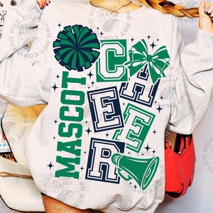 May include: A light gray sweatshirt with a cheerleading design. The design includes the word "MASCOT" in green, and the word "CHEER" in green and navy blue. A green pom-pom, bow, and megaphone are also featured.