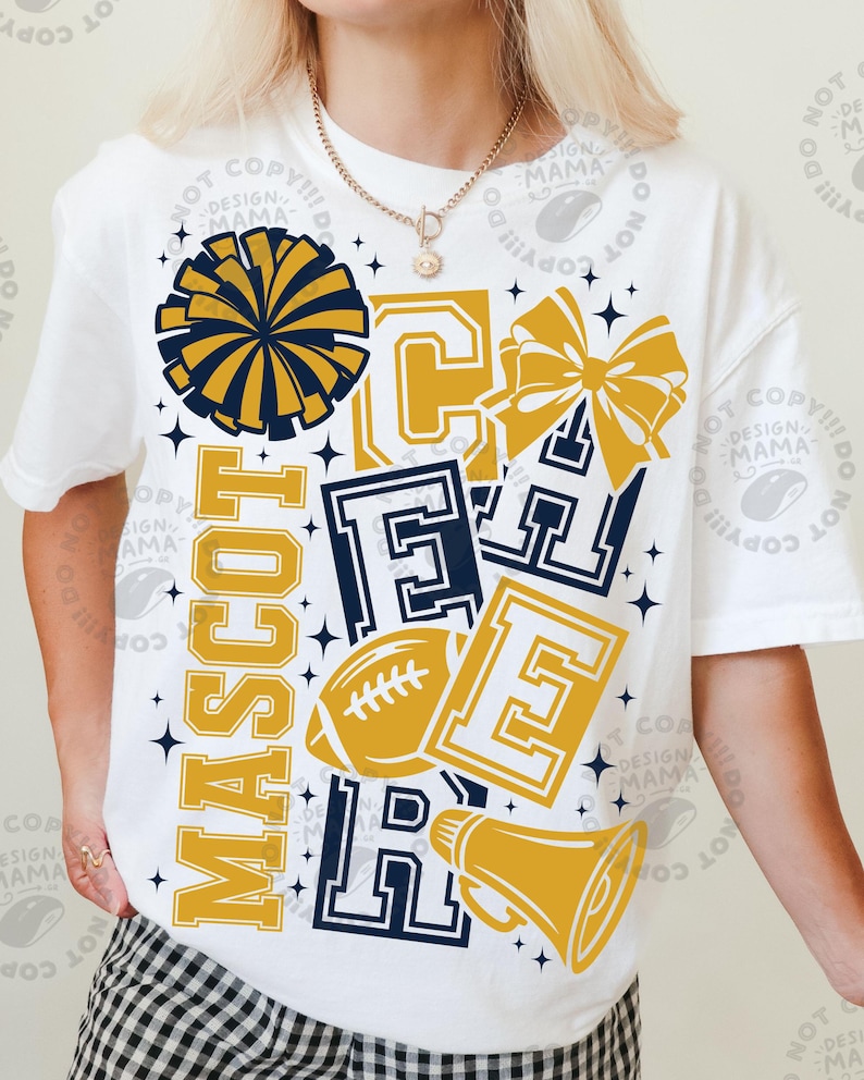May include: A white short-sleeve t-shirt featuring a graphic design with the word CHEER in large block letters, the word MASCOT, a navy blue pom-pom, a gold hair bow, a gold football, and a gold megaphone, all accented by small dark blue stars.
