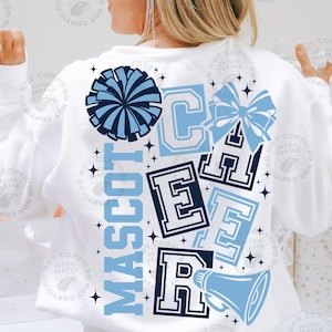 May include: White sweatshirt with a blue and navy design. The design includes the word "MASCOT" vertically, along with the letters "C", "E", "A", and "R", a pom-pom, a bow, a megaphone, and stars.