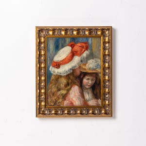 May include: A framed oil painting depicting two young girls wearing hats. The girl in the foreground is wearing a white hat with a red ribbon, while the girl in the background is wearing a straw hat. Both girls have long, flowing hair.