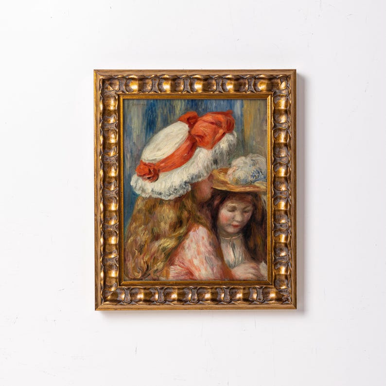 May include: A framed oil painting depicting two young girls wearing hats. The girl in the foreground is wearing a white hat with a red ribbon, while the girl in the background is wearing a straw hat. Both girls have long, flowing hair.