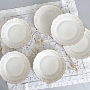 6 flat plates in white and gold porcelain, mid-20th century