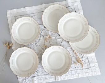 6 flat plates in white and gold porcelain, mid-20th century