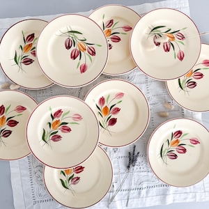 10 flat plates, Tulips model, Longchamp, mid-20th century