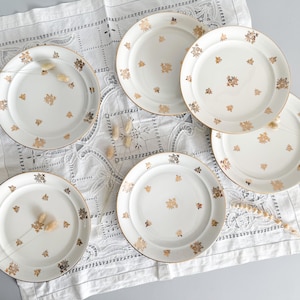 Flat plates in white and gold porcelain, French porcelain, mid-20th century