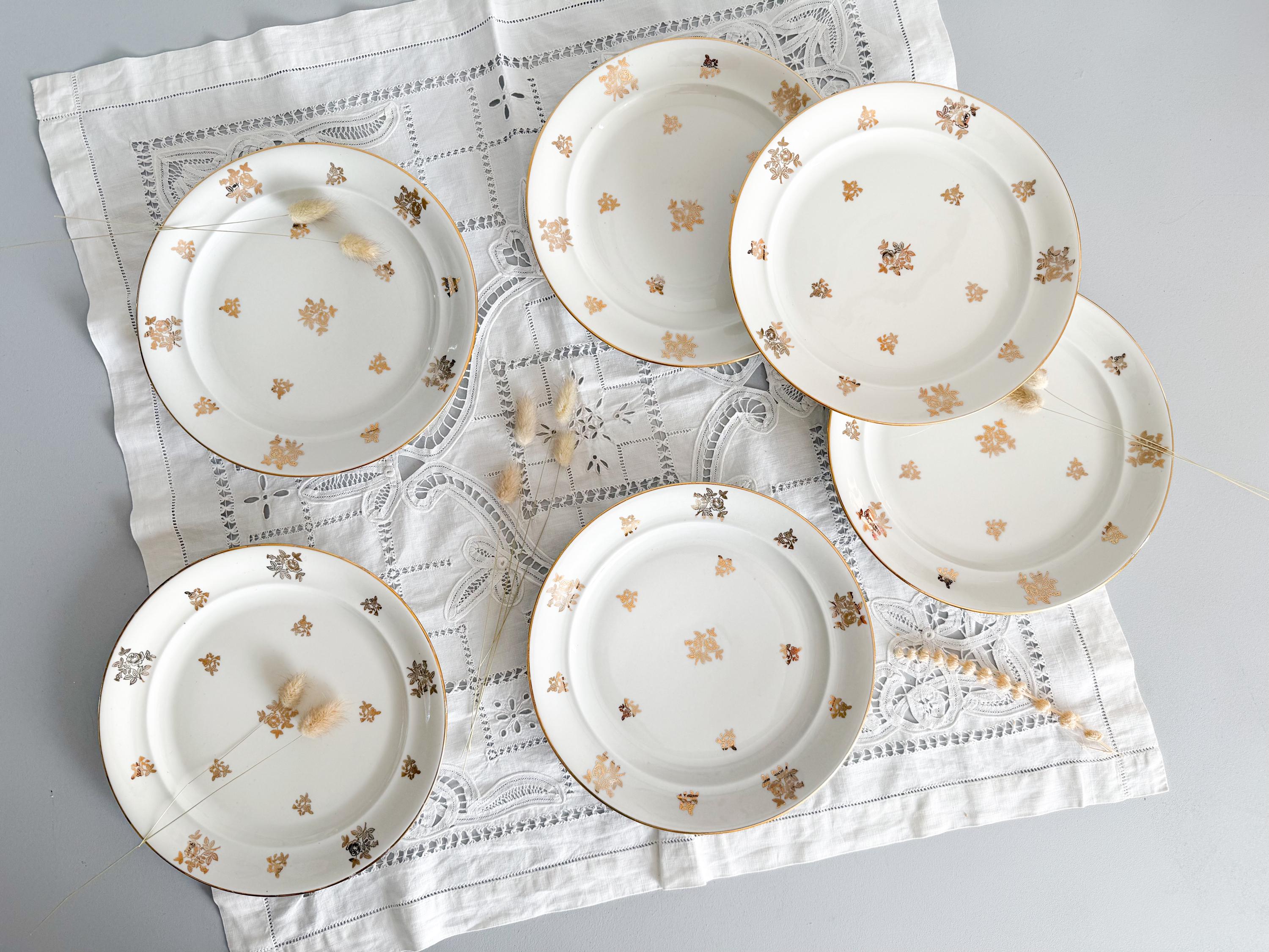 Flat plates in white and gold porcelain, French porcelain, mid-20th century