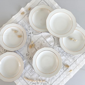 6 white and gold porcelain soup plates, mid-20th century