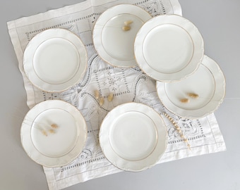 6 white and gold porcelain dinner plates, Kronester, Bavaria, mid-20th century