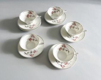 5 tasses à café en porcelaine de Limoges à décor japonisant vers 1930