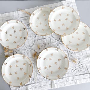 6 white and gold porcelain soup plates, Limoges, mid-20th century