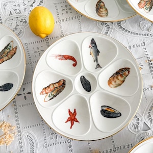 Plato de ostras o mariscos y crustáceos en porcelana, Louis Lourioux, Limoges, mediados del siglo XX
