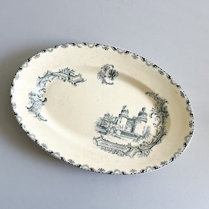 Oval ironstone dish, Châteaux model, Léon Graves, Clairefontaine, early 20th century