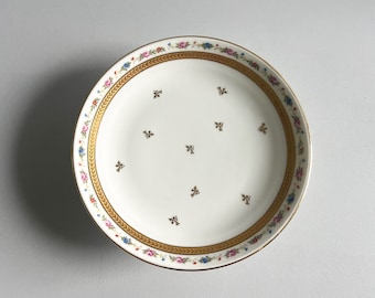 Assiette montée à décor fleuri en porcelaine de Limoges , milieu 20ème