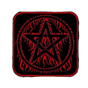 May include: A black and red embroidered patch featuring a pentagram inside a circle with flames. The pentagram is a five-pointed star with the points facing outwards.