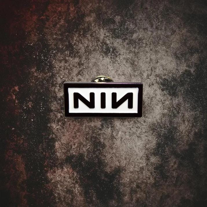 Nine Inch Nails Pin – Official NIN Logo (30 mm) – Black