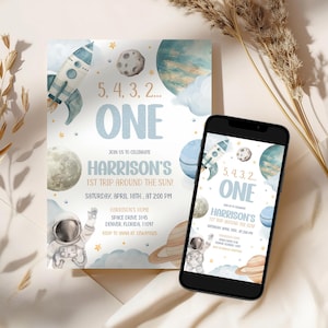 May include: A blue and white invitation with a rocket ship, planets, and stars. The text reads "5, 4, 3, 2... ONE" and "Harrison's 1st Trip Around the Sun!"