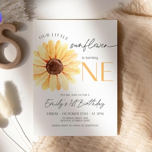 May include: A white invitation card with a watercolor sunflower illustration. The text reads "Our little sunflower is turning one. Please join us for a Emily's 1st Birthday. Friday - October 15th - at 3pm. Pumpkin Drive 3145, Denver, Florida, 11097. Kindly RSVP to Anna at 1256979325."