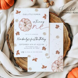 May include: A fall-themed invitation set with a pumpkin illustration and the text "Our Little Pumkin is turning one." The invitation includes details for Kimberly's first birthday, with a backside card. The set is on a wooden slice with pumpkins.