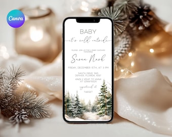 May include: A smartphone displays a baby shower invitation with the text "Baby, it's cold outside." The invitation features a winter forest scene and details for the event, including the honoree's name, date, time, and location.