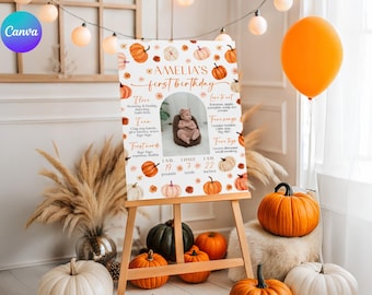 May include: A personalized birthday sign on an easel, decorated with pumpkins and fall colors. The sign reads "AMELIA'S first birthday" and includes baby's stats: 19 pounds, 7 teeth, and 22 inches. Pumpkins and a balloon are also in the image.