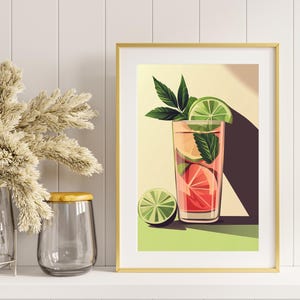 May include: A framed illustration of a glass of pink lemonade with lime slices and mint leaves. The background is a light yellow with a shadow cast from the glass.