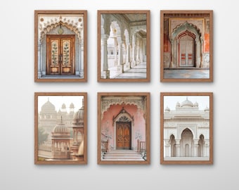 May include: Six framed prints featuring architectural details of Indian palaces. The images showcase ornate doorways, archways, and colonnades in various colors, including brown, white, and coral, with wooden frames.