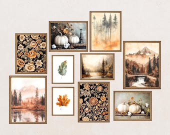 May include: A collection of framed art prints featuring watercolor paintings. The prints depict autumnal scenes, including landscapes with mountains and forests, floral patterns, and still life arrangements with pumpkins and leaves. The frames are a warm, golden brown.
