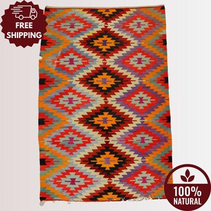 6x9 ft Ethnic Turkish Kilim Rug: Vintage Orange and Red Wool, Handmade Bohemian Eclectic Accent for Living or Dining Room