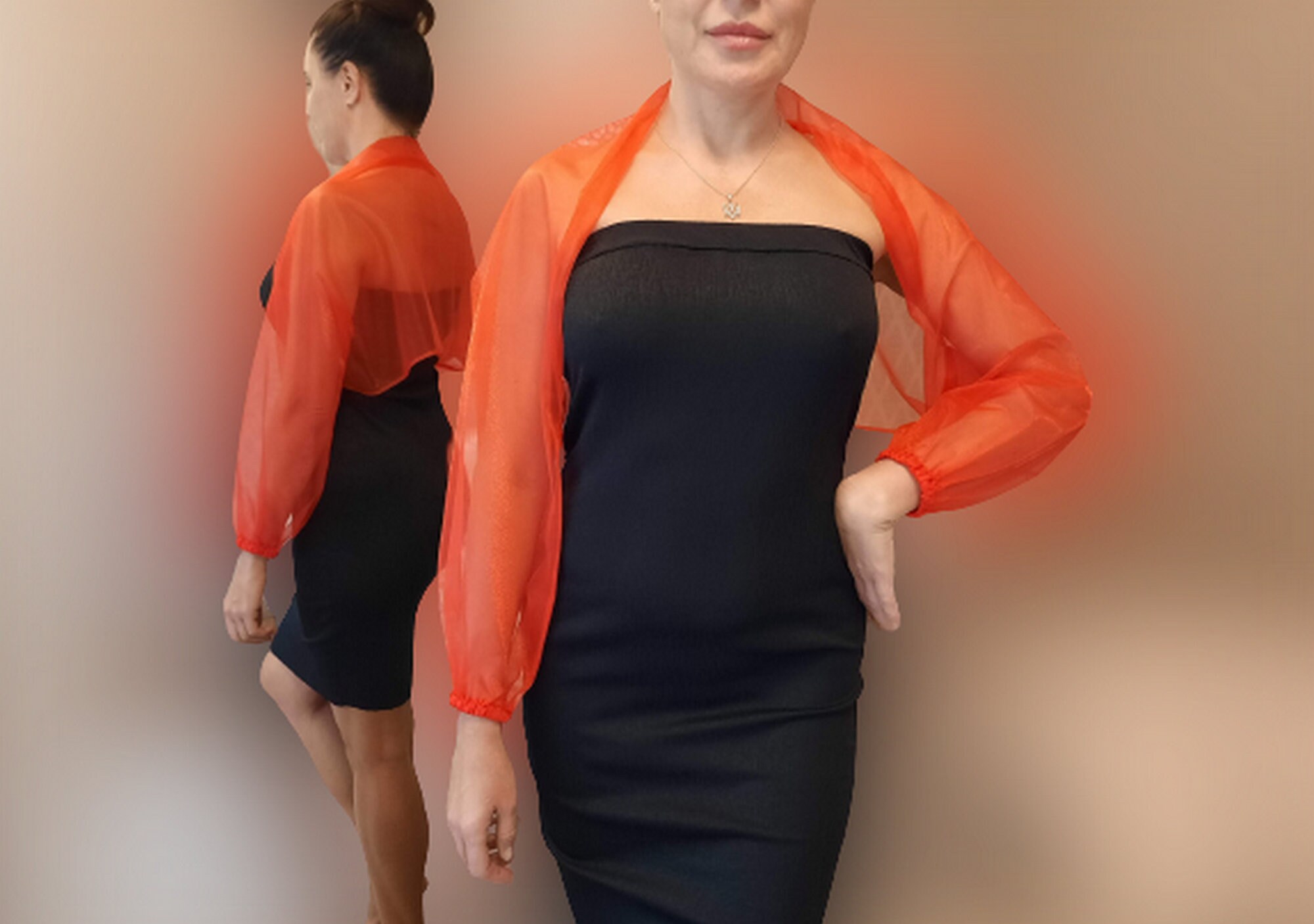 The sleeves are a shawl made of red, knitted organza. A stylish addition to your dress .