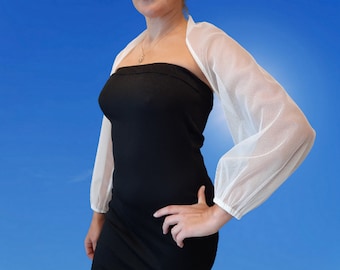 The sleeves are a cape made of the finest off-white tulle , will be a beautiful addition to your wedding or evening gown.