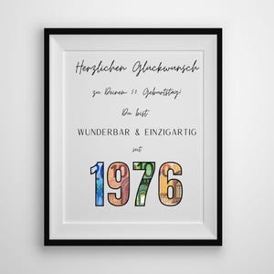 May include: A framed print with black border, featuring text in German. The text reads "Herzlichen Glückwunsch zu Deinem 50. Geburtstag! Du bist wunderbar & einzigartig seit 1976." The numbers are filled with colorful currency.