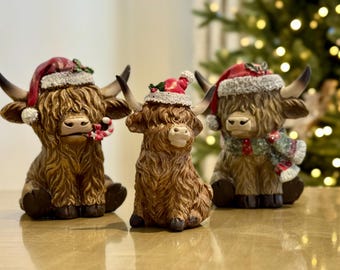 Adornos navideños de vacas de las Tierras Altas - Figuritas festivas con gorros de Papá Noel