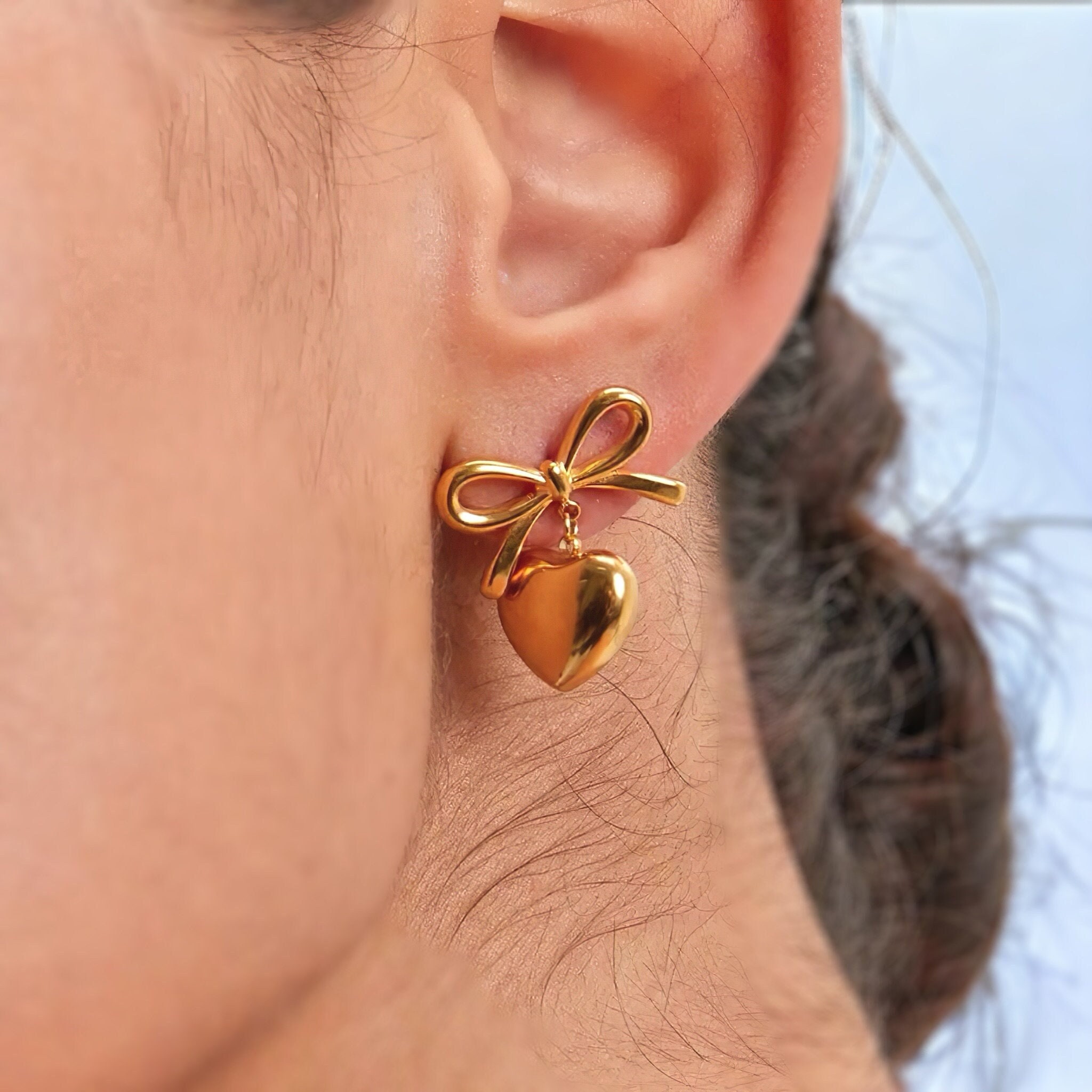 White gold hotsell bow earrings