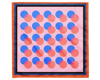 May include: A square scarf with a pink background and a pattern of overlapping blue and coral circles. The scarf has a black border, with a blue and orange border on the outside.