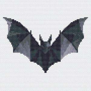 Puede incluir: Un murciélago negro con alas grises se representa en un patrón de punto de cruz. El murciélago está de frente con las alas extendidas.