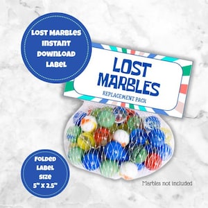 May include: A mesh bag filled with colorful marbles, including blue, green, red, and white. The image includes a label that reads "LOST MARBLES REPLACEMENT PACK" and "INSTANT DOWNLOAD LABEL". The folded label size is 5" x 2.5".