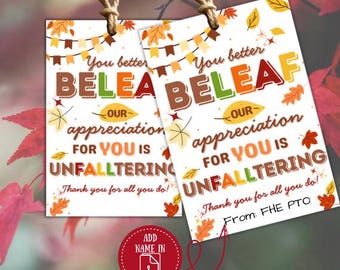 May include: Two gift tags with a fall theme. The tags have a white background with autumn leaves and the text "You better BELEAF our appreciation for you is UNFALLTERING." The tags are tied with twine.