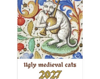 May include: A 2027 12-month wall calendar featuring a medieval-style illustration of a white cat playing a golden bagpipe. The background displays colorful floral patterns and red pomegranate motifs. The text reads Ugly medieval cats 2027.