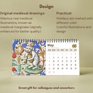 May include: A spiral-bound desk calendar displaying the month of May. The left page features a colorful medieval marginalia illustration of a creature playing a musical instrument amidst floral patterns. The right page shows a calendar grid for May.