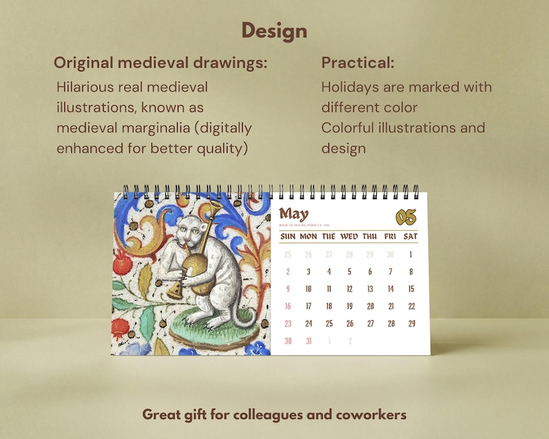 May include: A spiral-bound desk calendar displaying the month of May. The left page features a colorful medieval marginalia illustration of a creature playing a musical instrument amidst floral patterns. The right page shows a calendar grid for May.