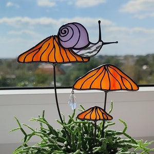 Magical Snail on Orange Mushroom Plant Stake. Enchanting Stained Glass Garden Decoration