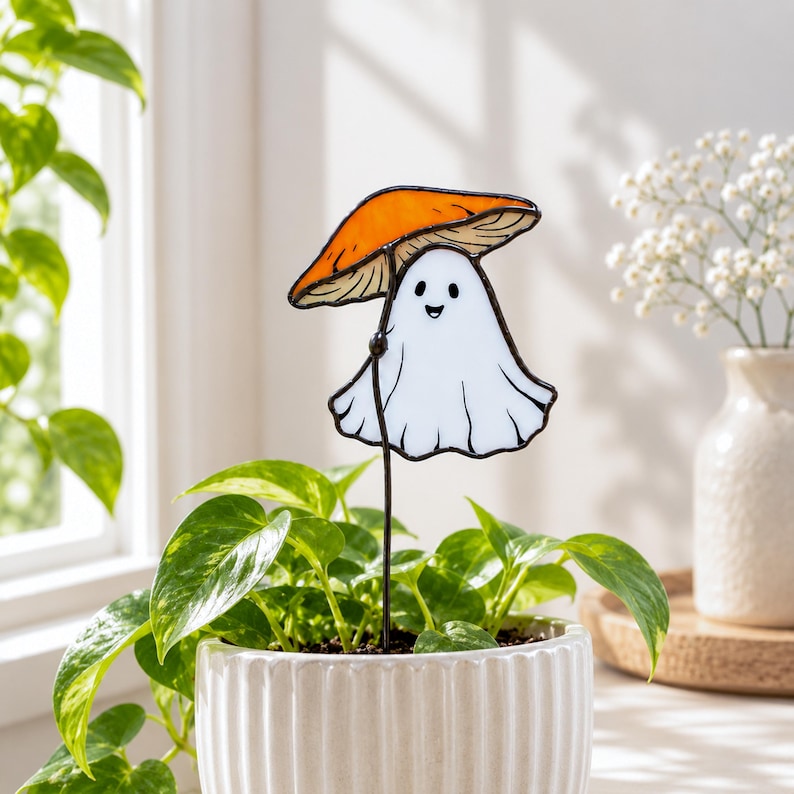 Stained glass ghost under orange mushroom plant stake. Christmas gift for mom. Cute ghost decor, handmade mushroom gift, whimsical garden decor